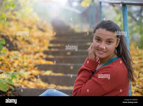 Beautiful Girl Sitting On The Stairs Stock Photo Alamy