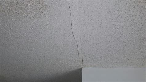 What causes cracks in walls and ceilings? Popcorn ceiling texture crack - Yelp