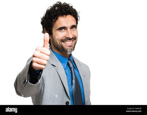 Portrait Of A Smiling Businessman Giving Thumbs Up Stock Photo Alamy