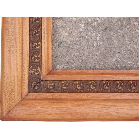 The red bole (a clay) underneath the gold leaf imbues the frame with a reddish hue that highlights incised details; Large Ornate Oak Victorian Picture Frame 23" x 26" from ...