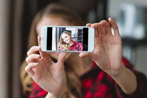 Charming Cheerful Young Woman Taking Selfie With Smartphone Stock Image