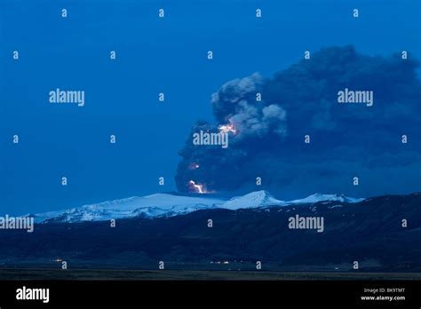 Volcanic Eruption In Eyjafjallajokull Iceland And Bolt Of Lightnings