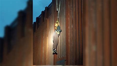Woman Left Dangling From Border Fence Rescued By Border