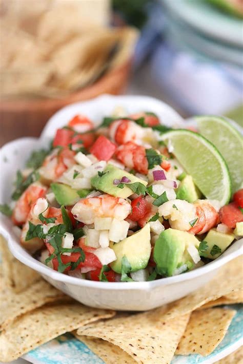 This shrimp ceviche is made with limes, lemon, red onion, cucumber, chile peppers, cilantro, and avocado. The Very Best Shrimp Ceviche Recipe - The Suburban Soapbox
