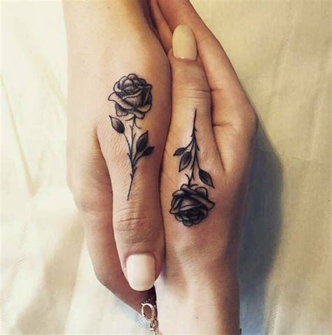 Awesome realistic thorny rose tattoo for men hand. Rose thumb tiny tattoo | Tattoos for daughters, Hand ...