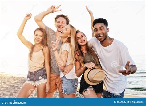 Group Of Friends Having Fun On The Beach Concept Of Summertime Stock Image Image Of Holiday