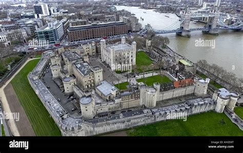 Aerial View Flying Over Tower Of London Wall Castle With Tower Bridge