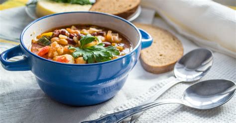 Bowl Of Soup And Two Silver Spoons · Free Stock Photo