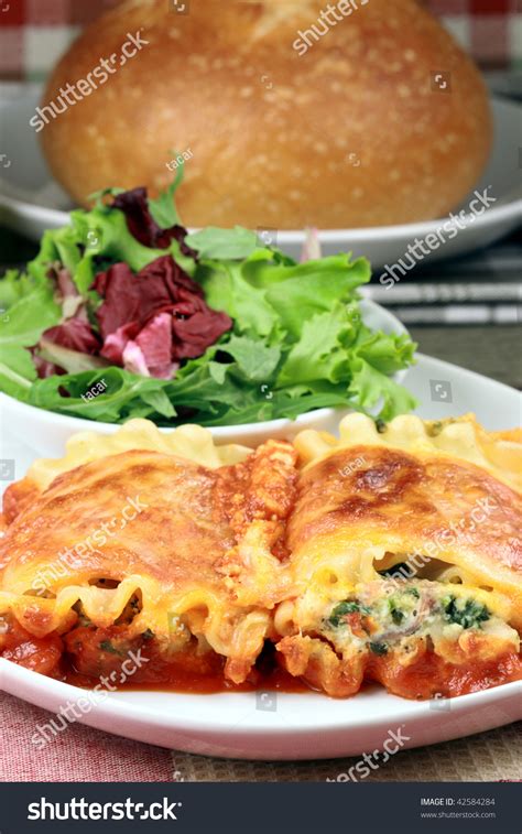Italian Lasagna Rolls Made With Tomatoes Spinach And Ricotta Cheese