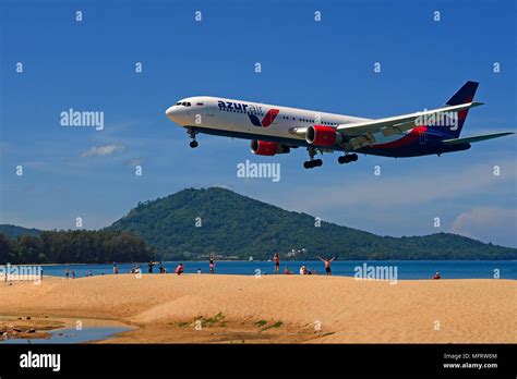 Airplane Azur Air Landing Over Sandy Beach Mai Kao Beach Phuket