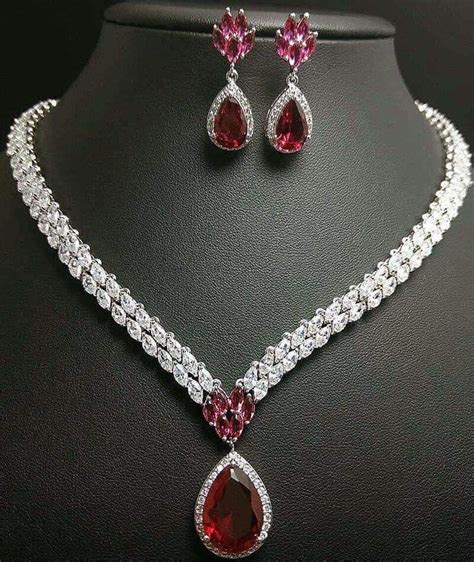 A Beautiful Diamond And Ruby Necklace And Matching Earrings Diamond