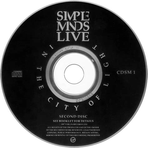 Carátula Cd2 De Simple Minds Live In The City Of Light Portada