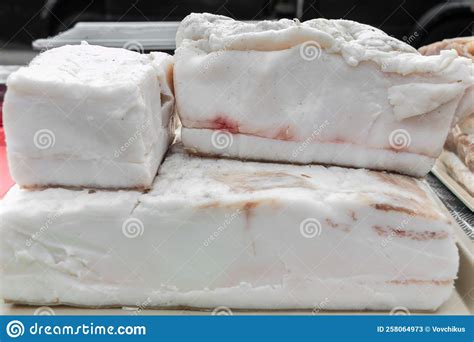 Large Chunks Of Fresh Salted Bacon On The Counter Of A Village Market