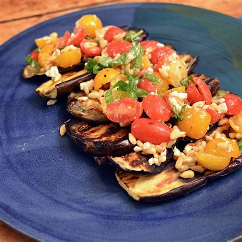 stylish cuisine grilled eggplant with tomatoes basil and feta