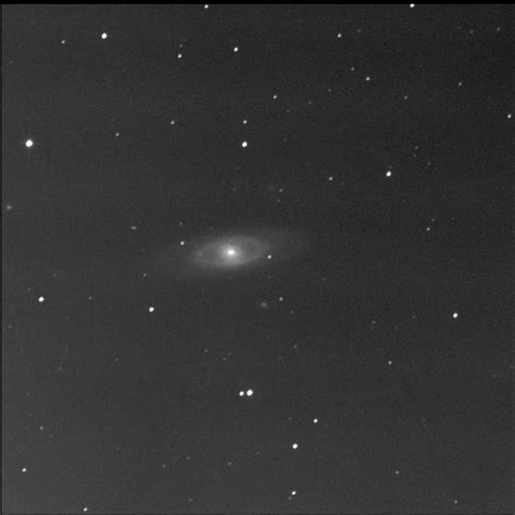 Also called arp 12, it's about 62,000 light years across, smaller than the milky way by a fair margin. lumpy darkness: caught NGC 4274 (Halifax)