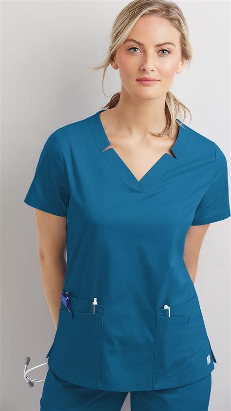 Add Some Edge To Your Traditional V Neck Scrub Top In New Color Blue