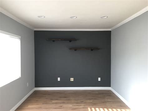 What colour painting should I put on the darker gray wall? (Image from ...