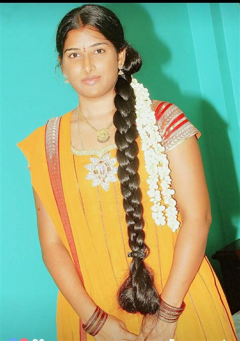 Tamil Girl Sporting A Long Hair Which Is Oiled And Neatly Braided She