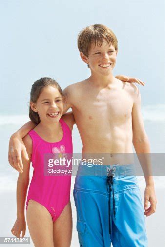 Brother And Sister At The Beach Photo Getty Images