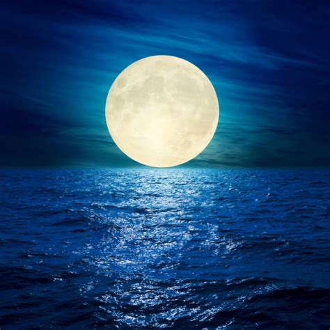 Moon Over Water Stock Photos Pictures And Royalty Free Images Istock