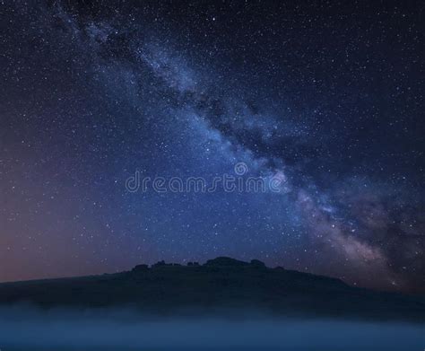 Stunning Vibrant Milky Way Composite Landscape Image Over The Tors In