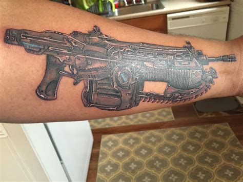 My First Tattoo Gears Of War Chainsaw Lancer Done By Jason At