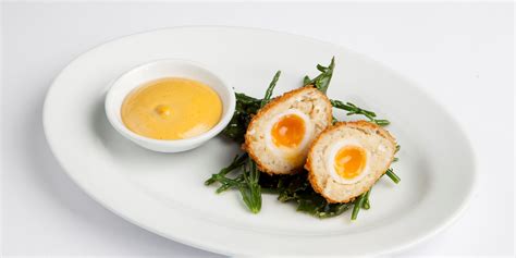 Garnish with pickled cucumbers, caviar and a sprig of dill. Smoked Cod Scotch Eggs Recipe With Aioli - Great British Chefs