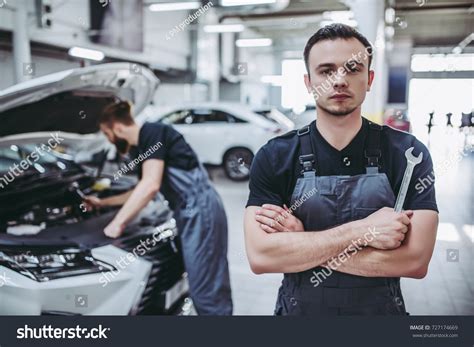 Two Handsome Mechanics Uniform Working Auto Stock Photo 727174669