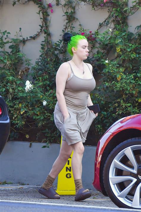Billie Eilish Wears Yeezy Sandals And A Nude Tank Top In Rare