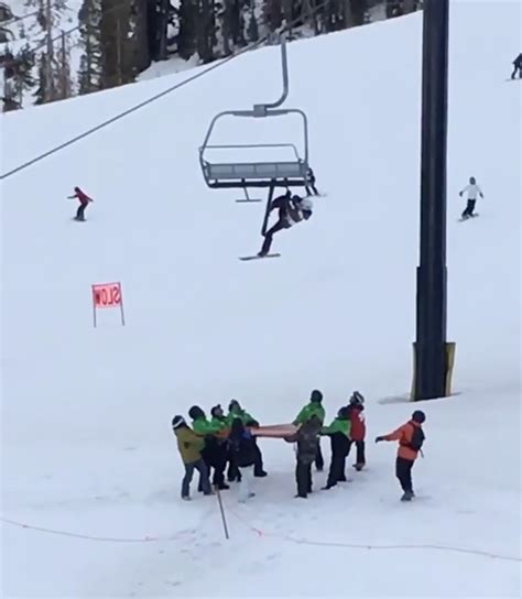 Terrifying Moment A Teen Skiier Dangles From A Mammoth Chairlift Before Dropping Into Rescue Net