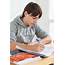 Teenager Doing Homework  Stock Image C034/0868 Science Photo Library