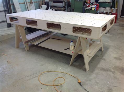(i don't put a finish on layout as shown in plans and the same technique as (#4.) pre vent pip es fro m p ull ing out once ins tal led. Bud's version of the Paulk Workbench #workbench #paulk # ...