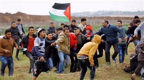Gaza Israel Border Clashes Leave 16 Palestinians Dead And Hundreds