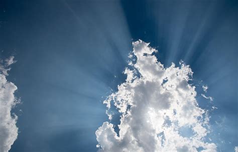 Blue Sky With White Clouds And Sun Rays Photograph By Michalakis Ppalis