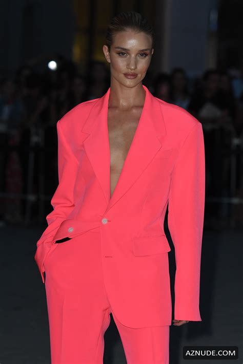 Rosie Huntington Whiteley Braless In A Pink Outfit At The Versace