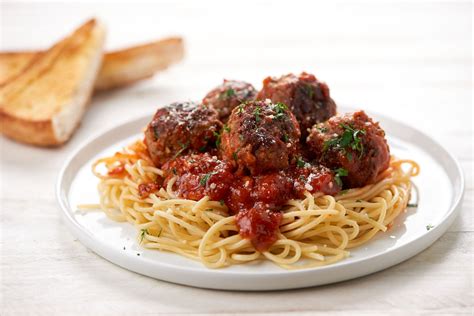 Spaghetti And Ricotta Meatballs With Pecorino Garlic Bread Italian