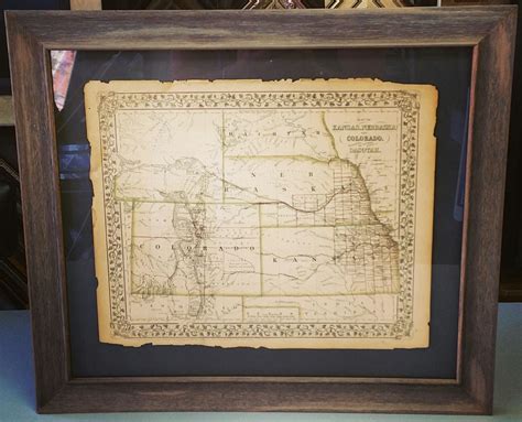 Custom Framed Map Floated On Top Of The Mat To Highlight The Tattered