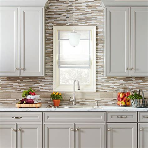 Although this crisp neutral is highly versatile, gray is one of the most challenging colors to select due to its shifting. Gray kitchen cabinetry - Lowes - Cabinets shown are ...
