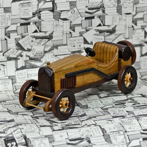 CLASSY vintage wooden car... I wish I could drive by ...