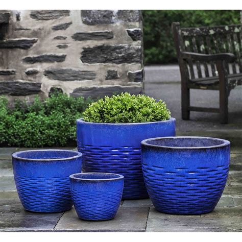 Here are some of the more common types you may run into as well as pros and cons for each: Hyphen Large Ceramic Plant Pots Blue | Kinsey Garden Decor