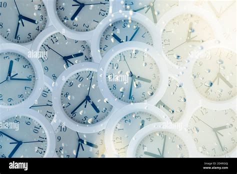 Background Made With Many Clocks Covered In Water Drops Stock Photo Alamy
