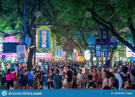 Crowded Street With Tourists In The Xi An Muslim Quarter At Night