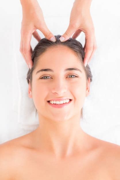 Premium Photo Attractive Woman Receiving Head Massage At Spa Center