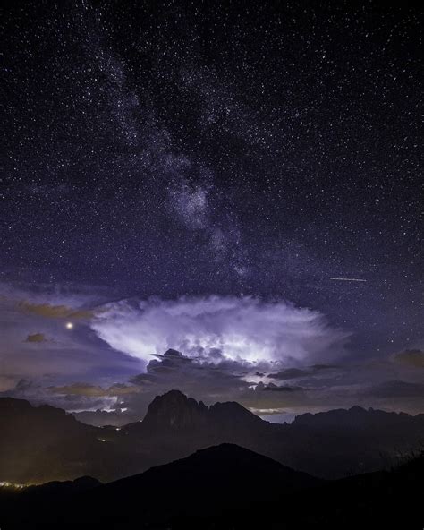 The Milky Way Rising From An Eruption In The Sky Over Sassolungo In The