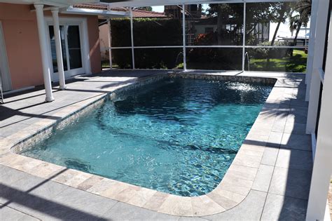 The pool made the news recently because it is leaking so much water that the daily water bill is $1,000. Swimming Pool Remodeling Photo Gallery - Grand Vista Pools