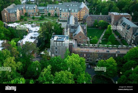 An Aerial View Of Duke University Campus Surrounded By Green Trees