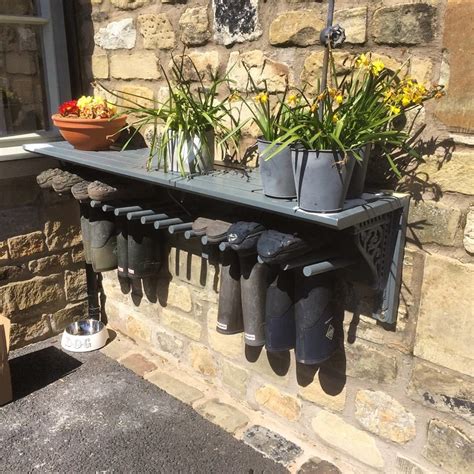 Drill drainage holes through the sole and the arch. Need this! Wellington boot rack with a shelf... | Backyard, Home and garden, Boot storage