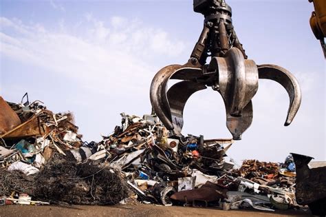 Premium Photo Industrial Scrap Metal Recycling And Crane Lifting