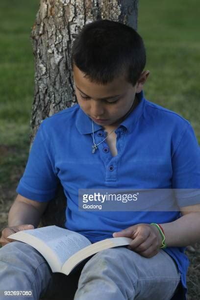 10 Year Old Reading Book Stock Fotos Und Bilder Getty Images