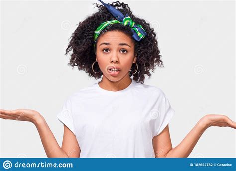 Puzzled African American Young Woman Shrug Shoulders Looks Uncertain